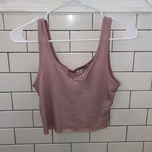 Cropped light pink tank top